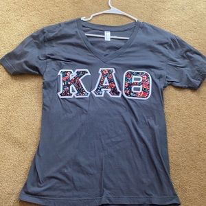Kappa Alpha Theta Letters, flower and grey shirt